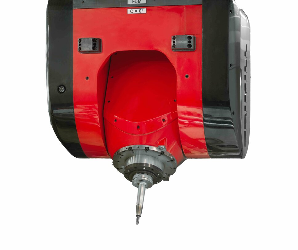 Präzisionsfräskopf für den modernen Werkzeugbau Eine präzise mechanische Bearbeitungseinheit in der Werkzeugbauindustrie. Das Bild zeigt den Kopf einer hochmodernen Fräsmaschine mit einem robusten Werkzeughalter. Die Maschine verfügt über eine rote und schwarze Verkleidung und ist darauf ausgelegt, Werkstücke mit höchster Genauigkeit zu bearbeiten. Dies ist ein typisches Beispiel für die fortschrittliche mechanische Bearbeitung im Werkzeugbau, insbesondere in der Automobilindustrie.